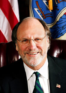   (John Corzine) 